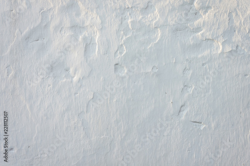 The texture of a plastered white wall. Close-up. Background