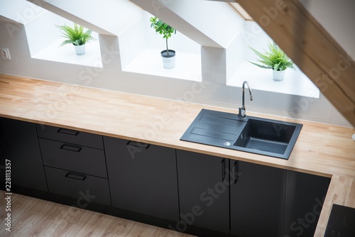 Obraz na płótnie Black sink in the kitchen. w salonie