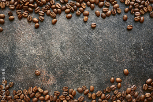 Food background with roasted black coffee beans.Top view with copy space. photo
