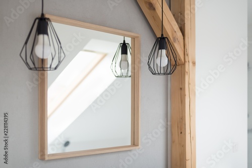 Mirror and lamps in bathroom