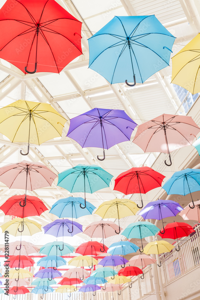 Colorful umbrellas displayed in shopping mall