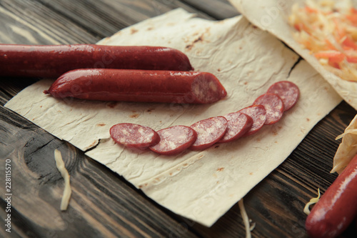 sliced sausage on pita bread .photo with copy space