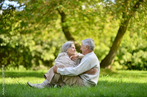 Portrait of elderly couple in autumn park