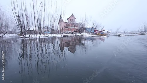 House near a lake in Kashmir, India.