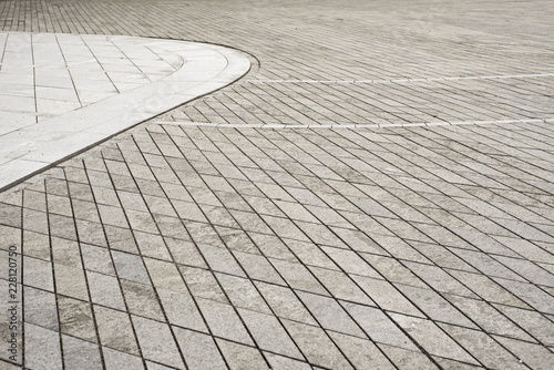 Gray tiled floor background. Old town square