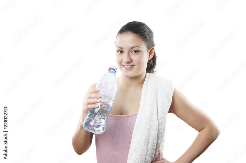 sporty young woman with towel and water bottle sporty young woman with towel and water bottle
