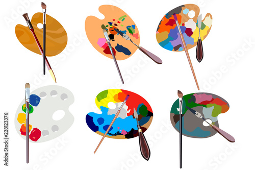 Set. Wooden palette for oil paints with brushes and palette knife isolated on white background. Top view.