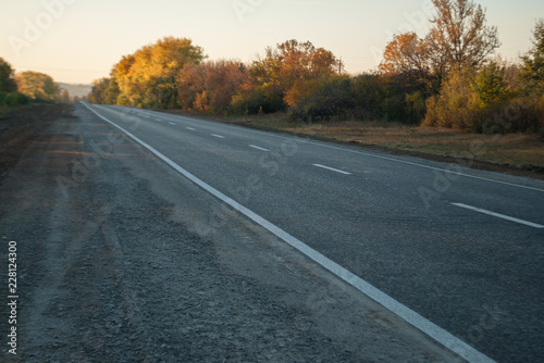 road leading to the horizon with dividing lanes