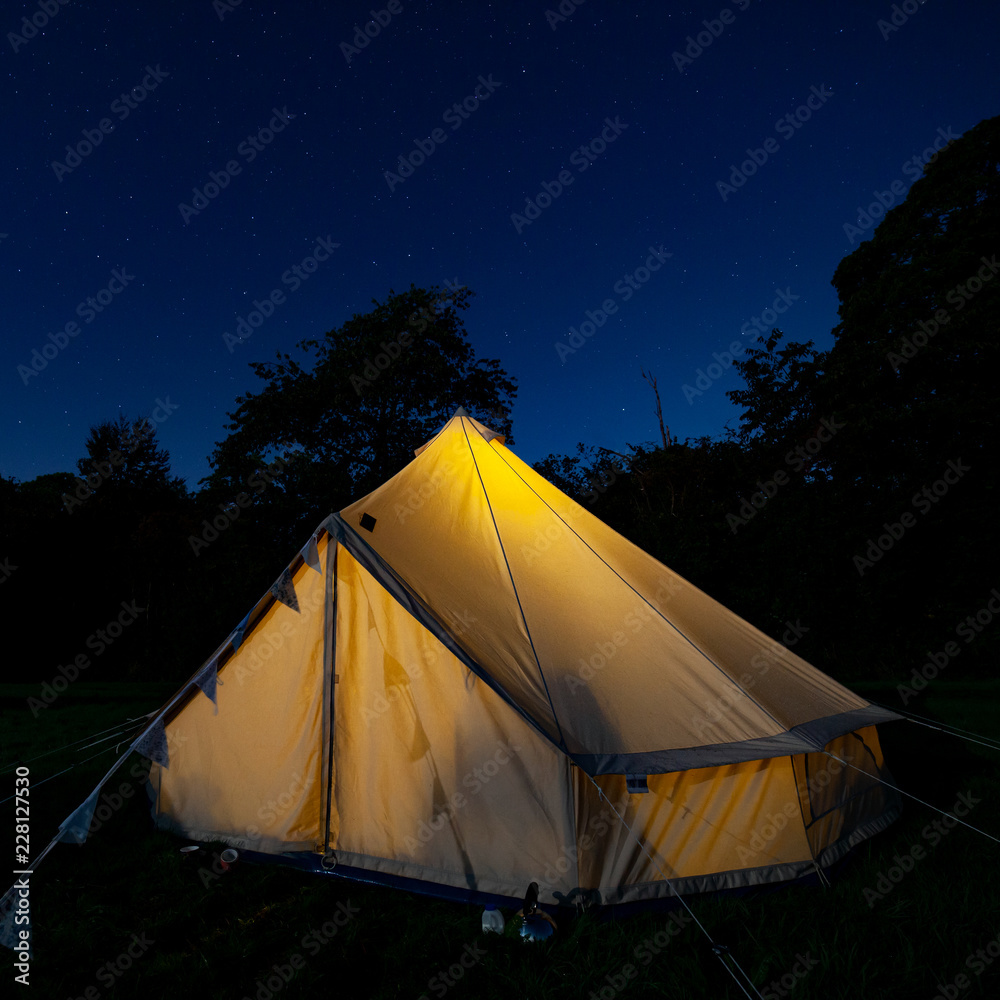 tent on a blue sky background