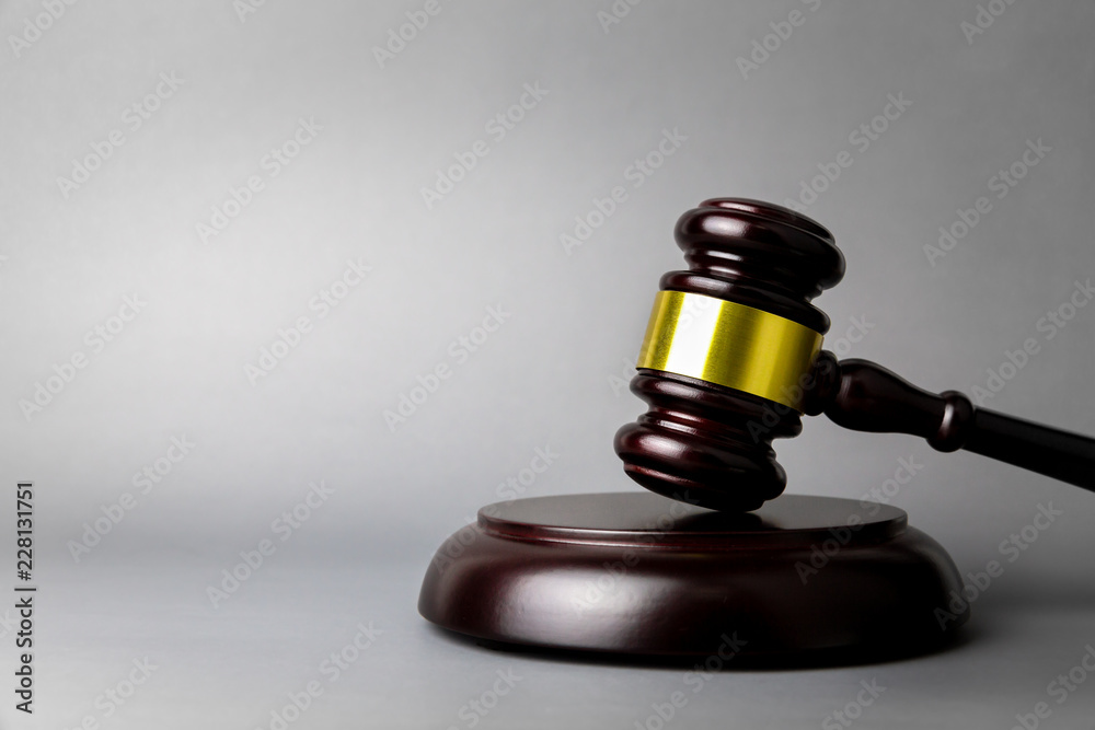 Judges gavel on gray background