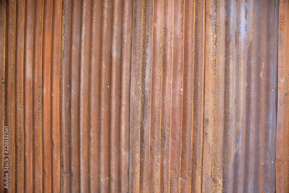 Zinc metal sheets corrosion with rusty abstract texture background or vintage wallpapers, Old house wall. Zinc metal sheets corrosion with rusty abstract texture background or vintage wallpapers, Old house wall.