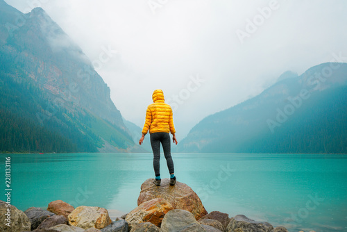 Woman Hiking by the Lake