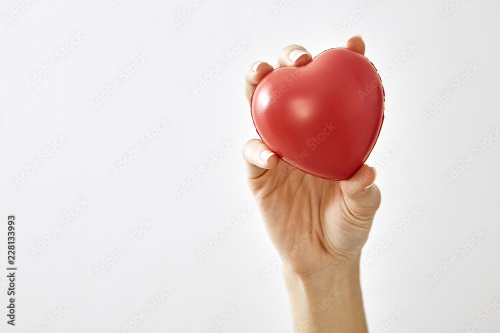 Red heart shape in hand