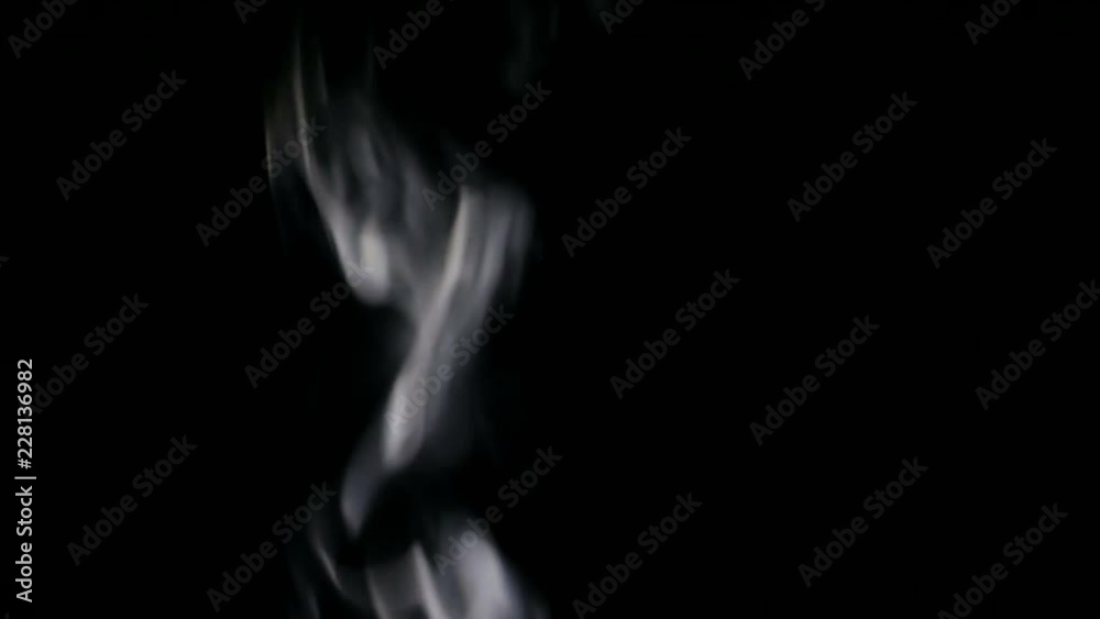White Steam Rises from up. White smoke over a black background. Smoke slowly floating through space against black background. 4K UHD White Steam Rises from up. White smoke over a black background. Smoke slowly floating through space against black background. 4K UHD