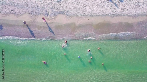 Aerial Front View Of Children Playing In Water In Odessa