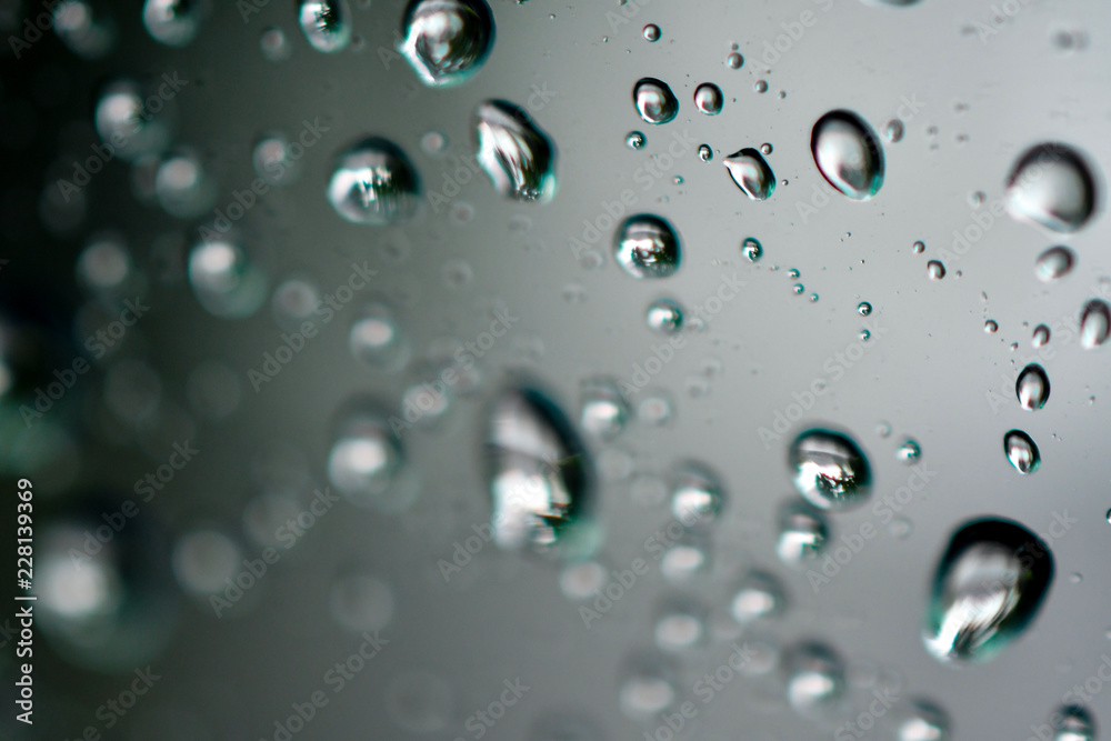 Macro raindrops water on glass Macro raindrops water on glass