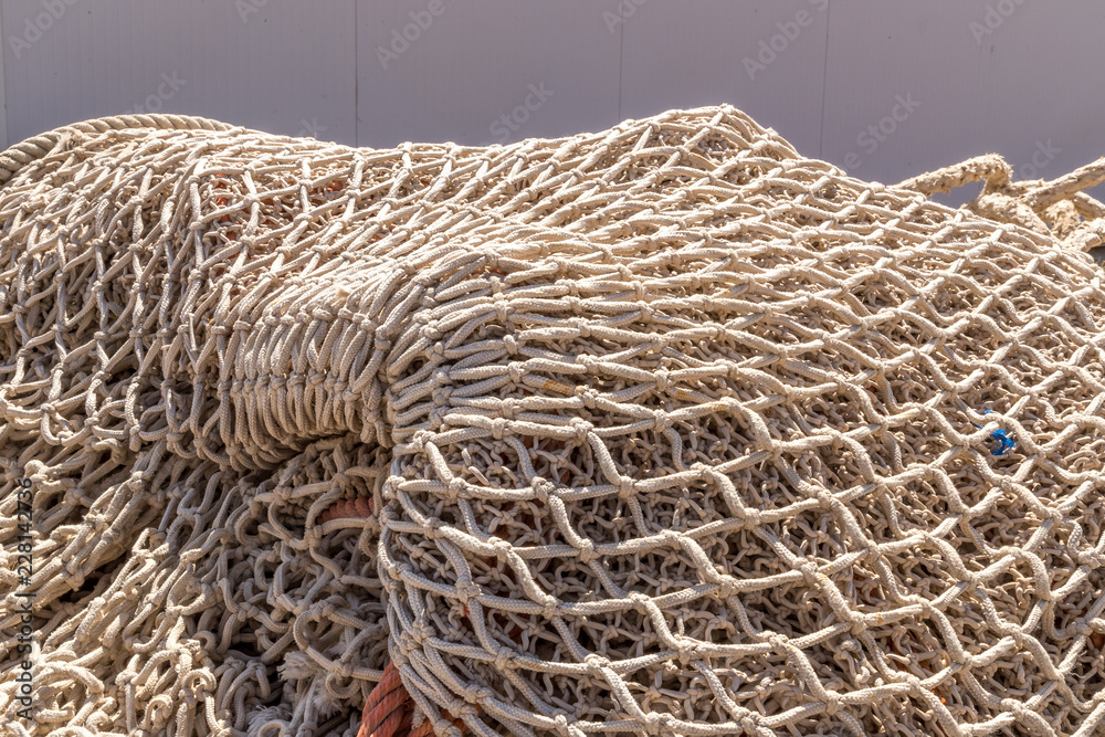 Close up view of fishing net. Fishing net background. Fishnet close up  Stock Photo