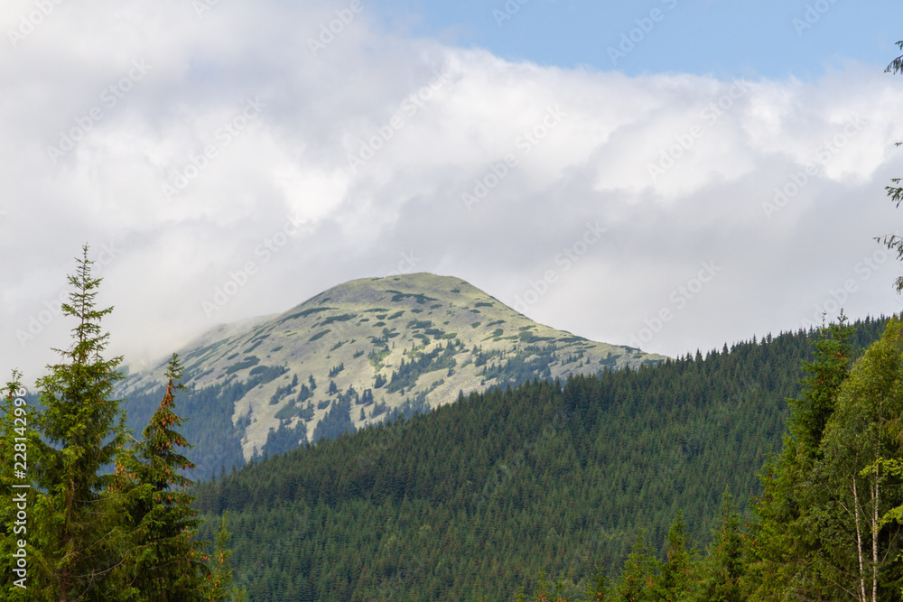 landscape with mountains and clouds