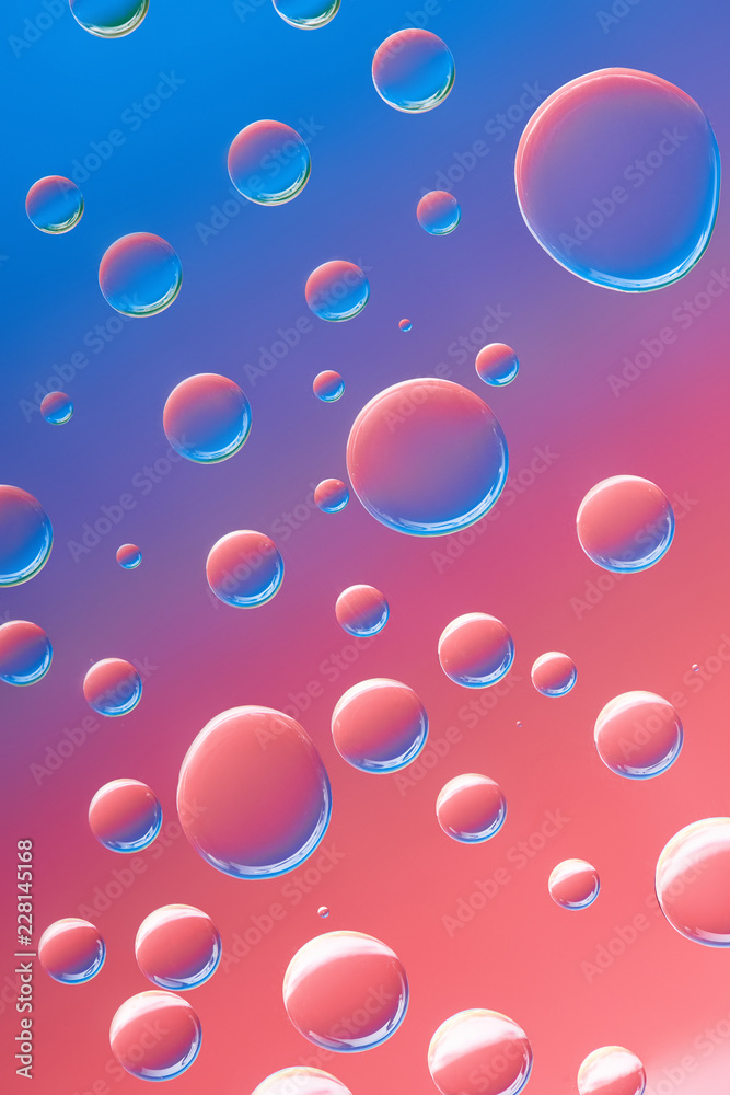 beautiful calm transparent water drops on bright abstract background