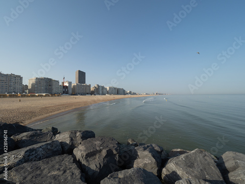 The skyline of Ostend, seen from the Western Strekdam. photo