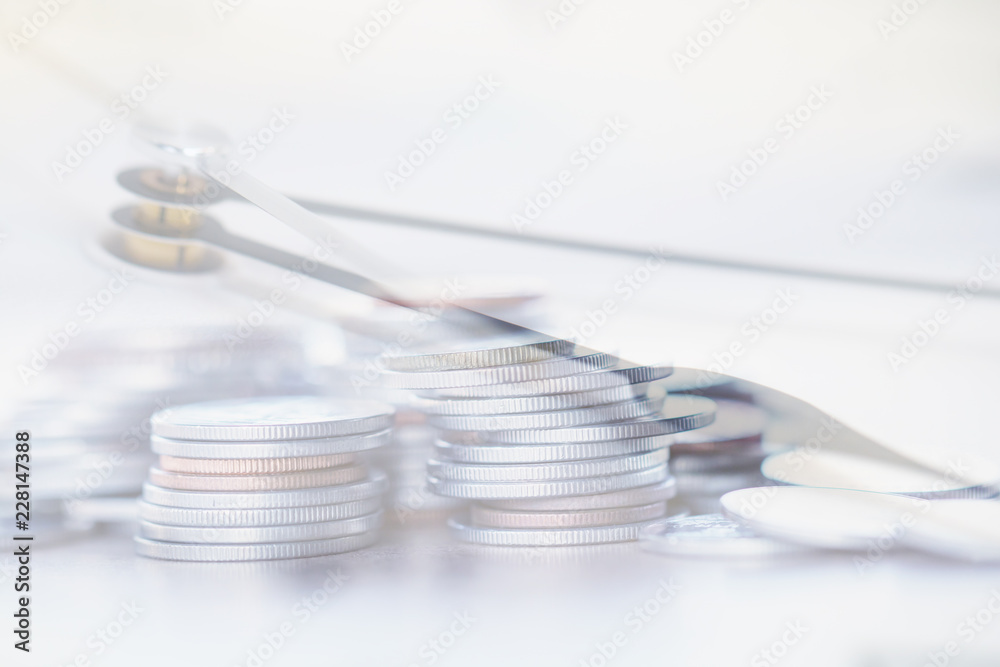Double exposure Rows of coins of Clock,cash,money, dollar on the table,finance and business concept,Tex time soft focus and blurred style,dark tone. Double exposure Rows of coins of Clock,cash,money, dollar on the table,finance and business concept,Tex time soft focus and blurred style,dark tone.