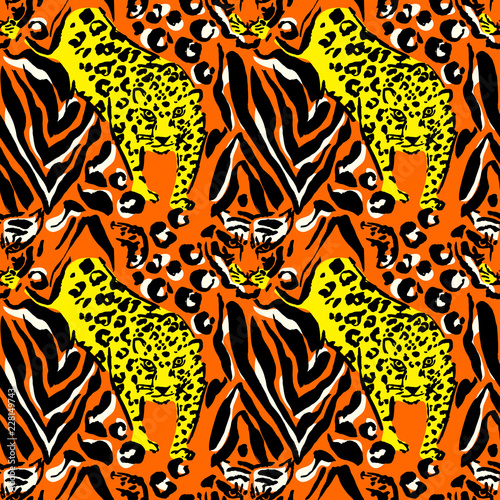Vector illustration leopard print seamless pattern. Orange and yellow tiger hand drawn background. Vector illustration.