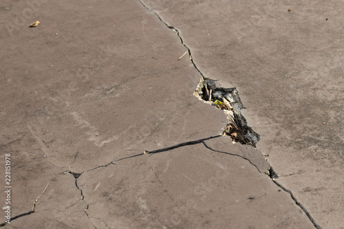 Broken brown tile floor