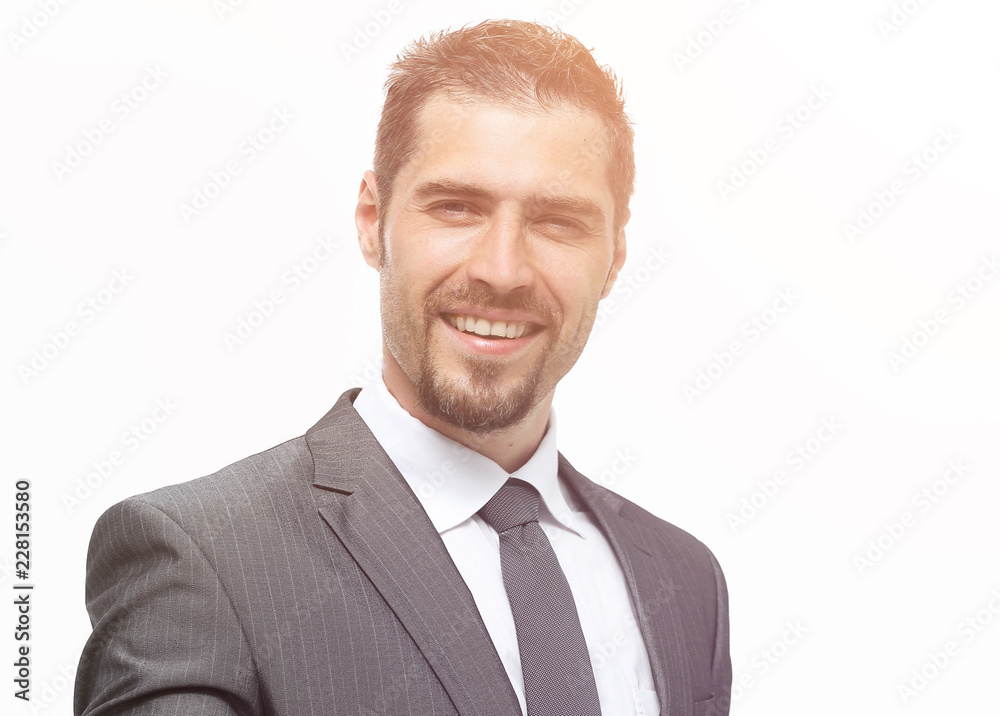 smiling businessman holds out his hand for a handshake smiling businessman holds out his hand for a handshake