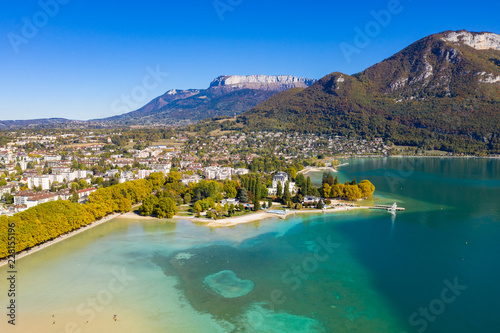 Fototapeta Naklejka Na Ścianę i Meble -  Aerial view of Annecy lake waterfront low tide level due to the drought in France