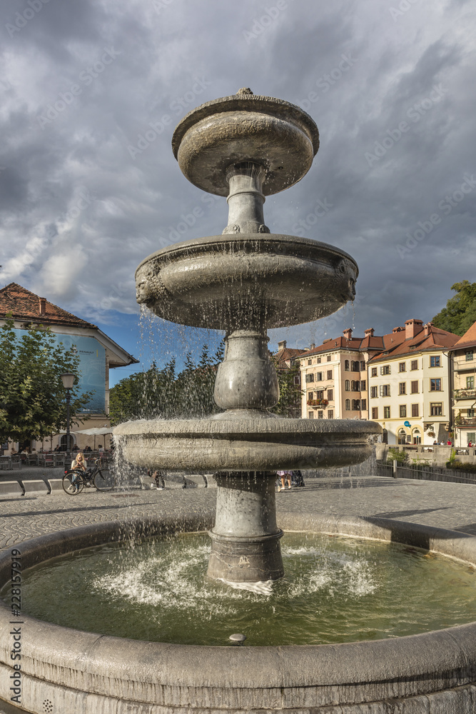 Fountain in Novi trg (city square) near river Ljubljanica in Ljubljana, Slovenia