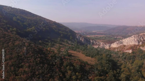 Aerial view of mountains in national park Cheile Nerei Beusnita in Romania. Part of Carpathian mountains with beautiful autumn colors.