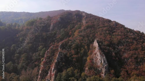 Aerial view of mountains in national park Cheile Nerei Beusnita in Romania. Part of Carpathian mountains with beautiful autumn colors.