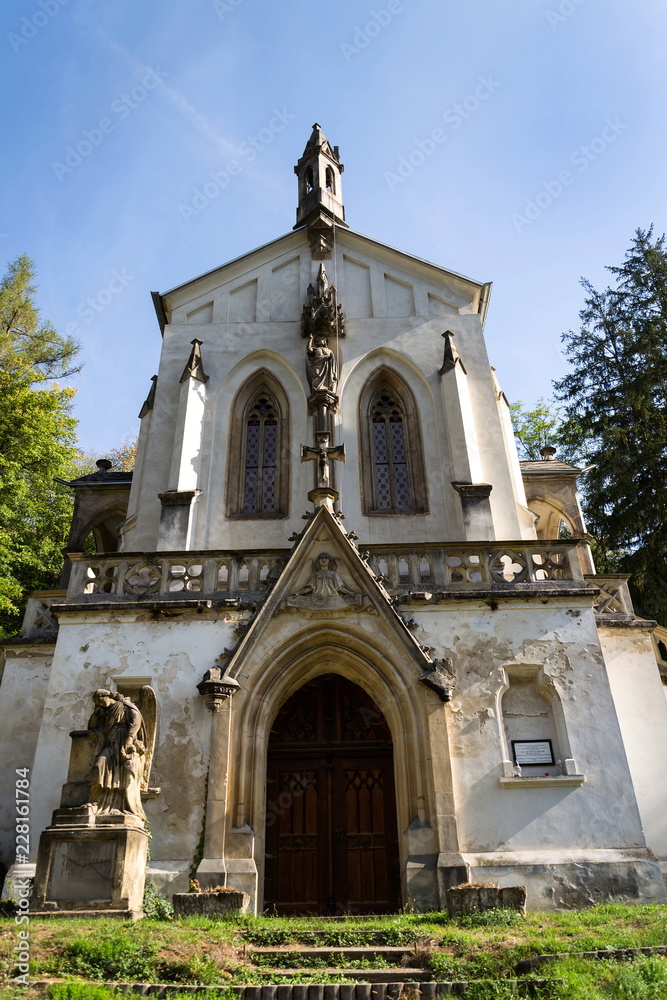 Saint Maximilian Chapel on cemetery in Saint John under the Cliff, Svaty Jan pod Skalou, Czech Republic, sunny summer day Saint Maximilian Chapel on cemetery in Saint John under the Cliff, Svaty Jan pod Skalou, Czech Republic, sunny summer day
