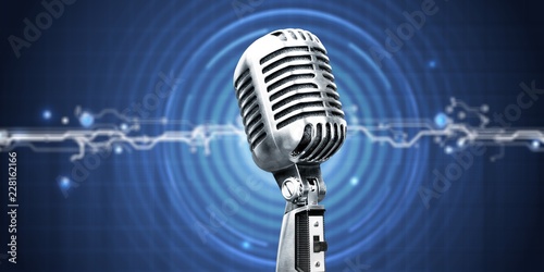 Retro style microphone on bokeh background