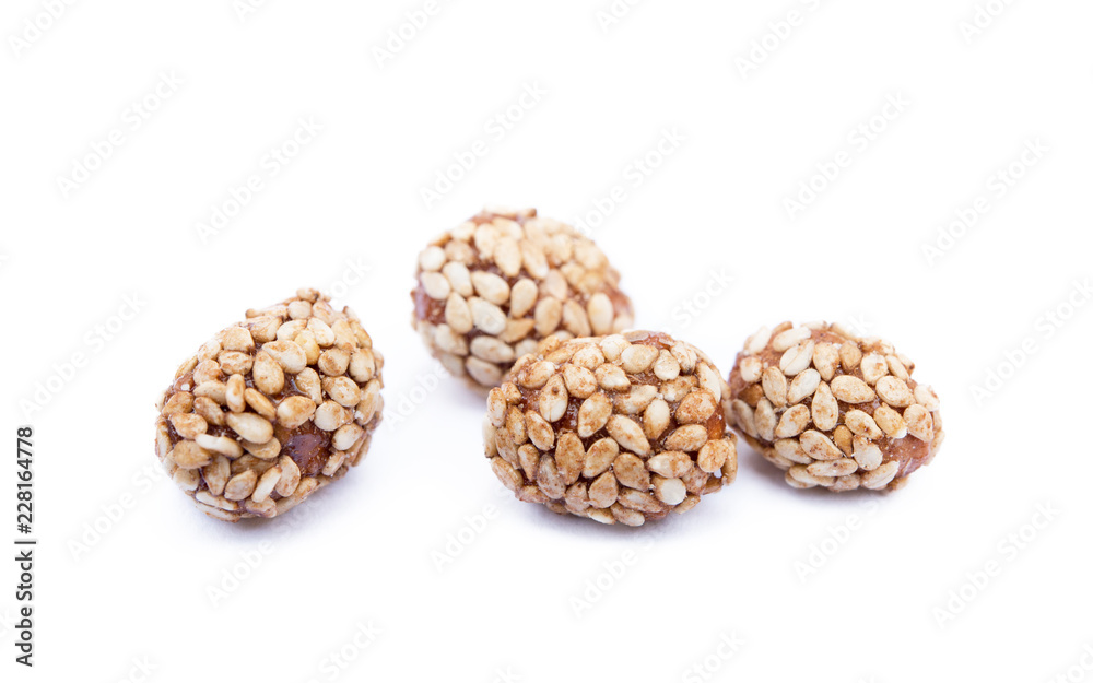 Coated peanuts with sesame isolated on white background Coated peanuts with sesame isolated on white background