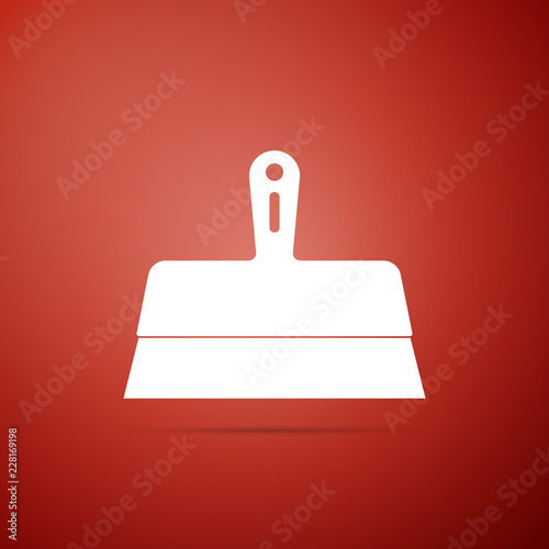Putty knife icon isolated on red background. Spatula repair tool. Spackling or paint instruments. Flat design. Vector Illustration