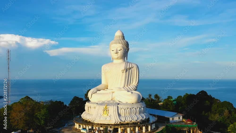 Time lapse aerial view at Phuket big Buddha is one of the island most important and revered .landmarks on Phuket island. Time lapse aerial view at Phuket big Buddha is one of the island most important and revered .landmarks on Phuket island.