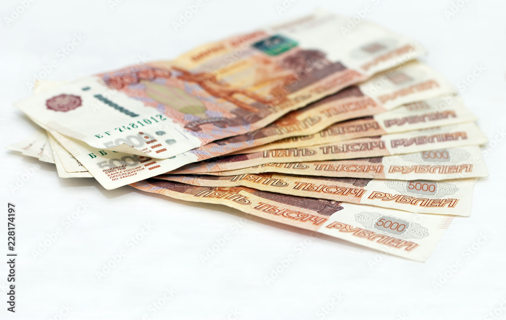 Scattered Russian 5000 rubles banknotes closeup Scattered Russian 5000 rubles banknotes closeup