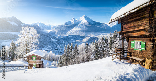 Winter wonderland with mountain chalets in the Alps