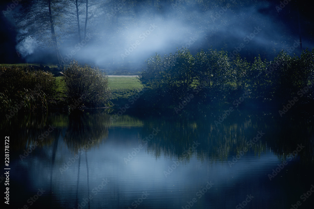 Beautiful nature landscape, amazing view of foggy mountain lake in the Indian Summer morning.