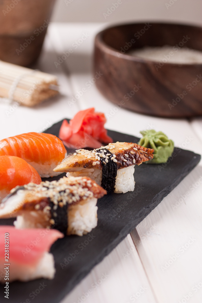 Rainbow Sushi with salmon, eel, tuna. Sushi menu. Japanese food. Rainbow Sushi with salmon, eel, tuna. Sushi menu. Japanese food.