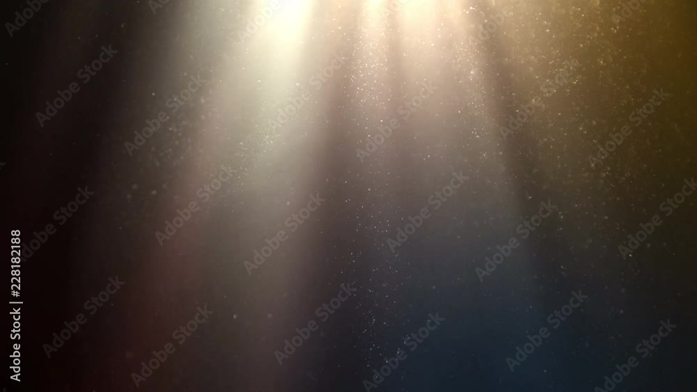 Flying dust particles on abstract background with colorful gradient and rays of light. Good for wedding backgrounds or festive titles.