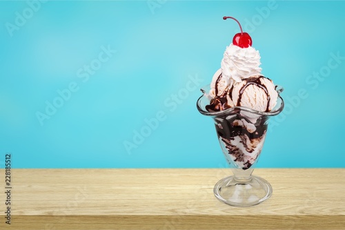 фотографія Chocolate ice cream in glass on  table
