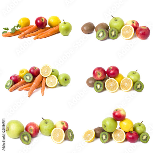 Fruits in a composition on a white background. Lemon with apples and kiwi on white background. Fruits with carrots on a white background.