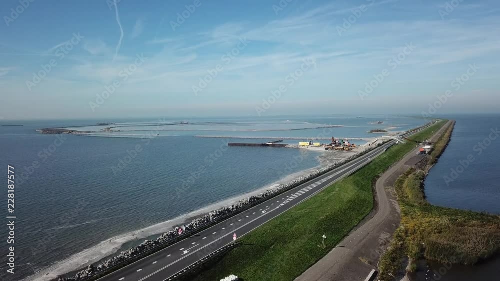 Aerial view of building a nature reserve area in lake Markermeer Holland the Marker Wadden along the dike Aerial view of building a nature reserve area in lake Markermeer Holland the Marker Wadden along the dike