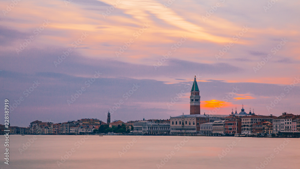 Naklejka premium St. Mark's Bell Tower and the city of Venice, Italy under sunset