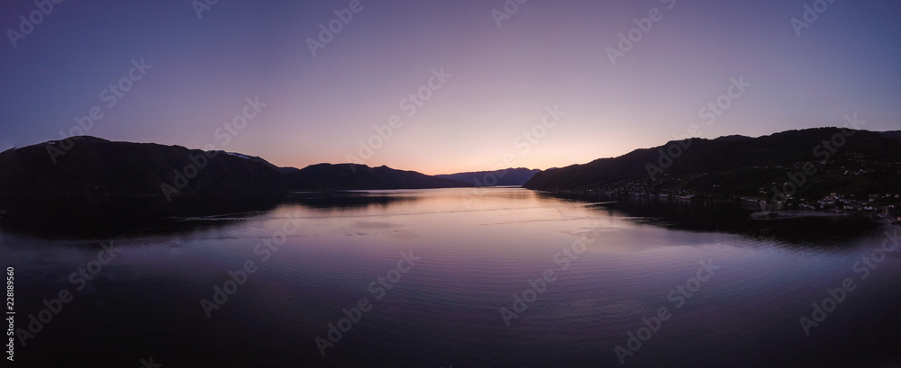 Fototapeta premium Aerial Drone Panorama of Sunset Reflection on Lake in Norway Scandinavia