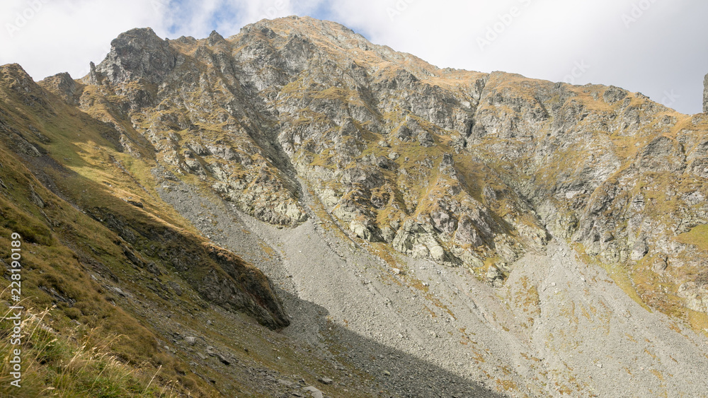 Mountain peaks and trails in summer time. Romania Mountain peaks and trails in summer time. Romania