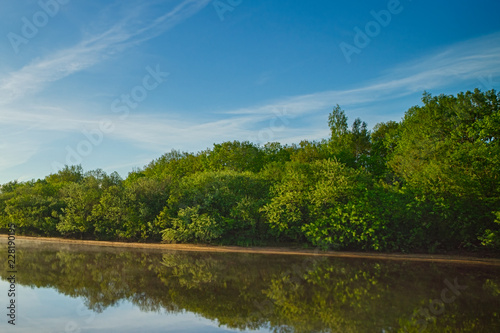 Boats on river at beautiful summer sunrise