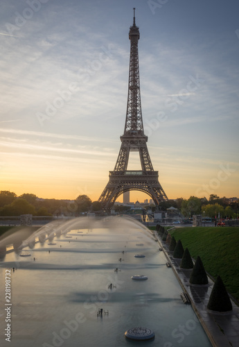 Paris, France - 10 13 2018: View of the Eiffel Tower with water jet from the garden of Trocadero at sunrise © Franck Legros